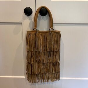 Posse suede fringe bag 16x10. Fringe hangs 19 inches.  Used but pristine.